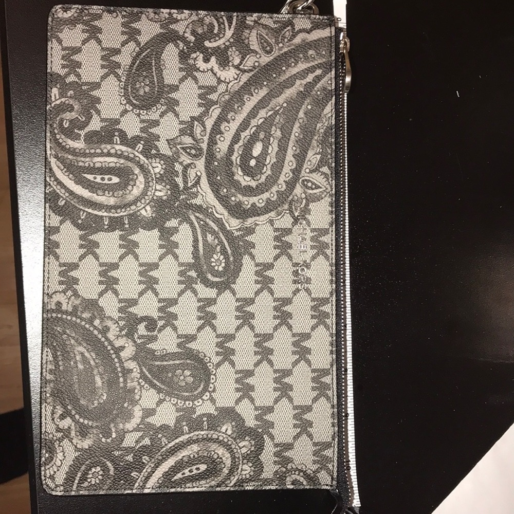 Michael Kors paisley print clutch.